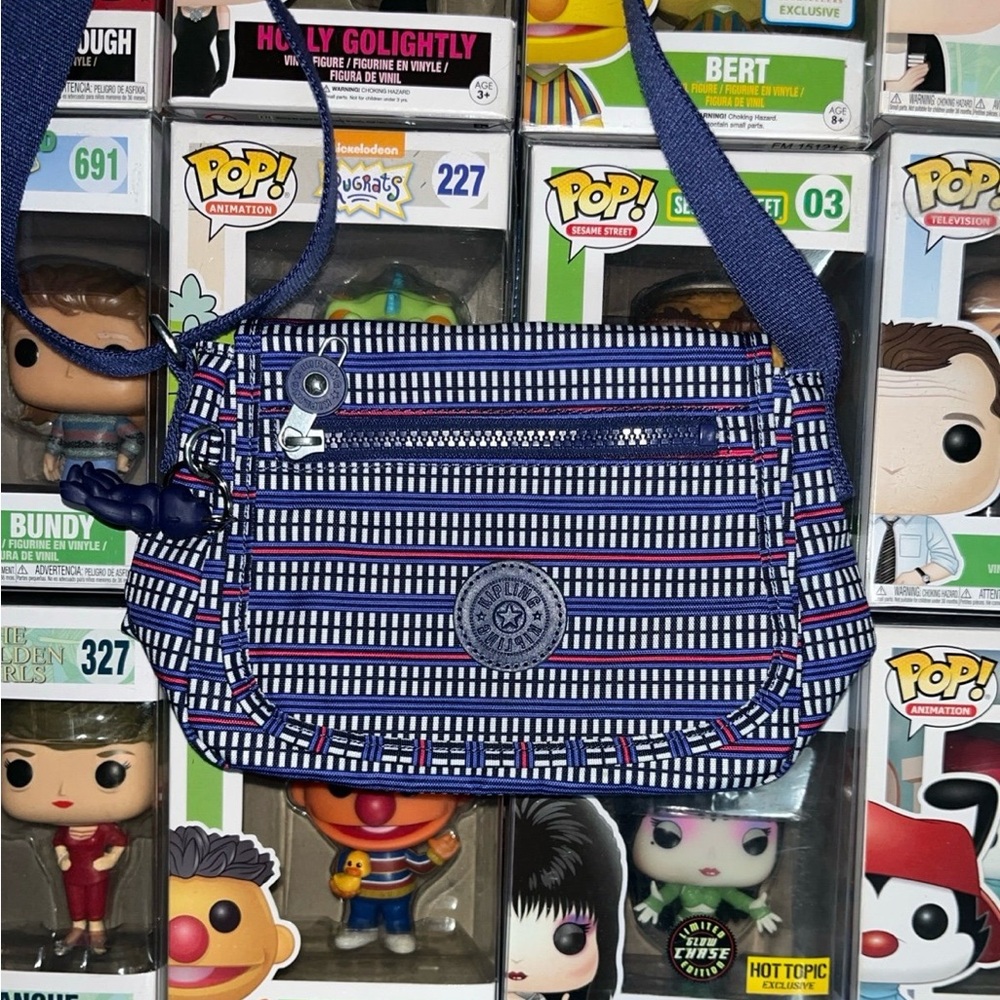 Kipling Blue and White Striped Crossbody Bag with Signature Charm